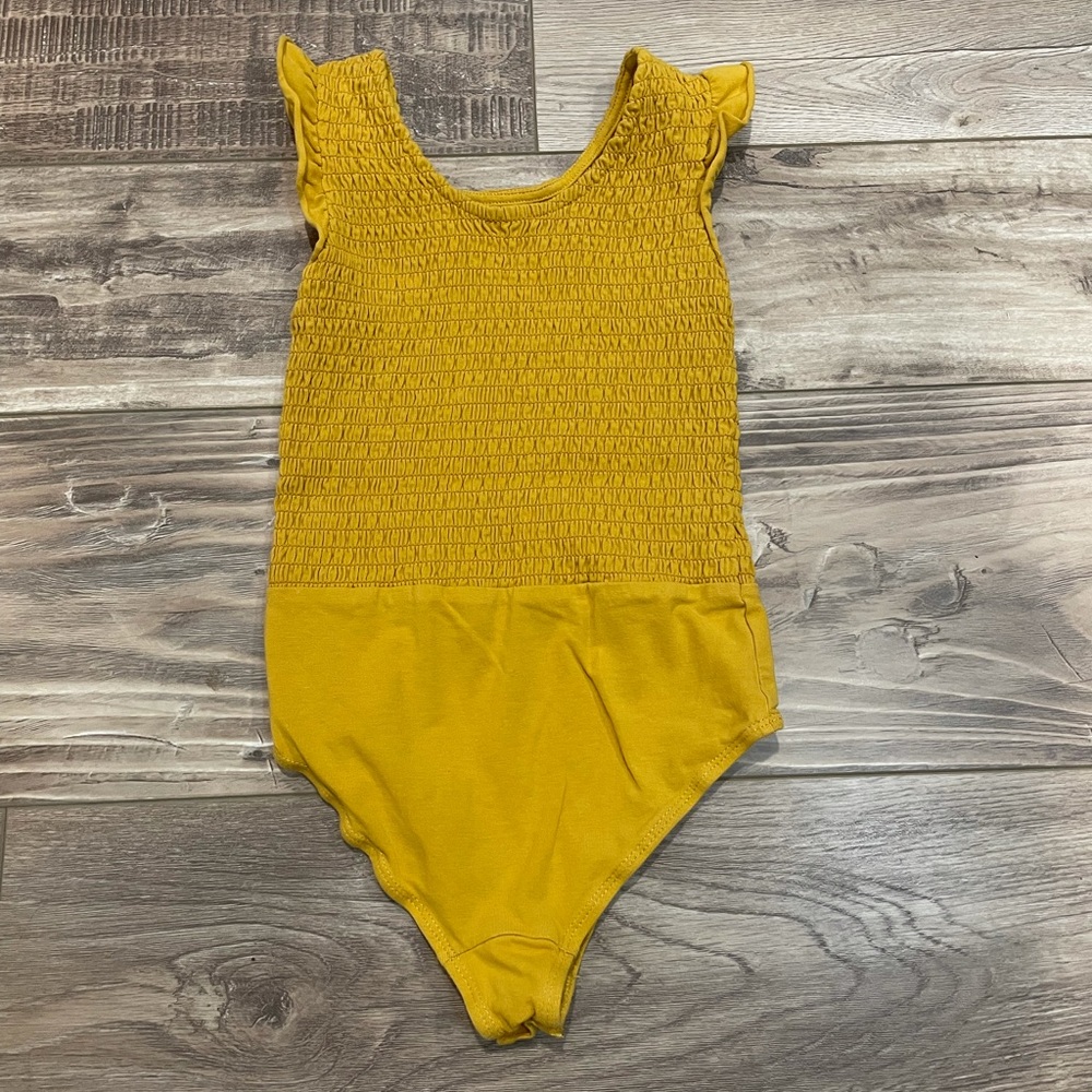 Mustard yellow leotard with ruffle detailing